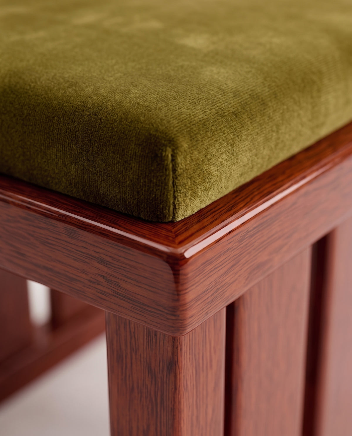 Cardinal chair, close-up of the green velvet seat and mahogany lacquer slatted base, Monde Singulier Editions