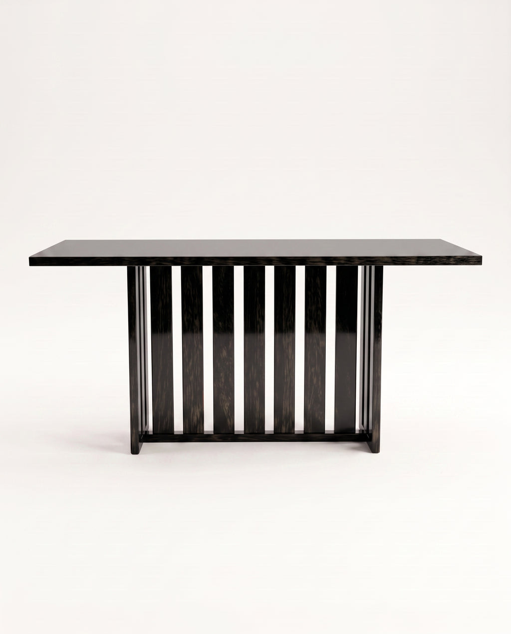 Cardinal dining table in black lacquer, side view of the slatted pedestal base under the long top, Monde Singulier Editions