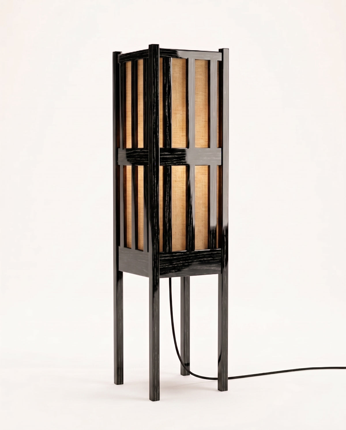 Cardinal floor lamp in black lacquered wood, slatted lantern shade with paper panels on a tall slender frame, Monde Singulier Editions, three-quarter view
