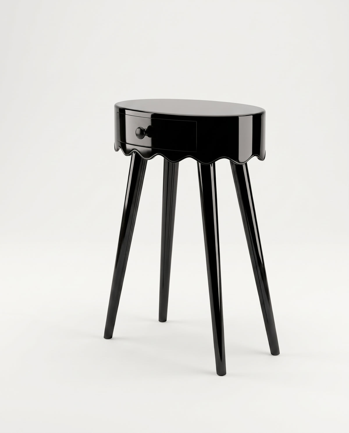 Romance round bedside table in black lacquer with scalloped apron, single drawer and three splayed legs, Monde Singulier Editions