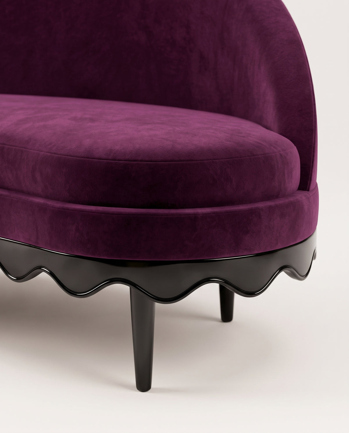 Romance sofa in aubergine velvet, close-up of the scalloped black lacquer base and turned legs, Monde Singulier Editions