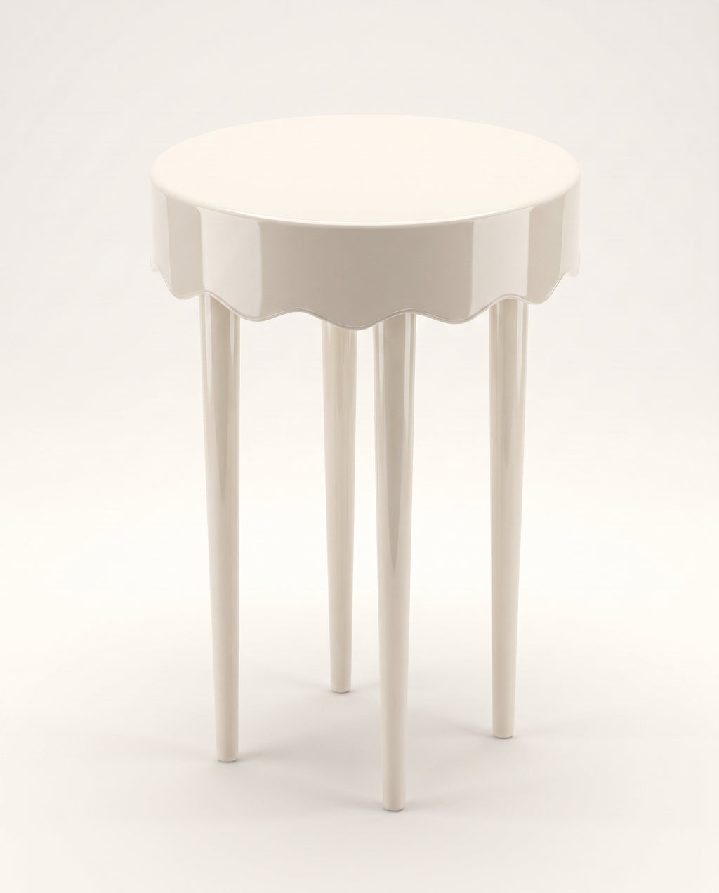 Romance side table in off-white lacquer, elevated view of the round top and scalloped apron, Monde Singulier Editions
