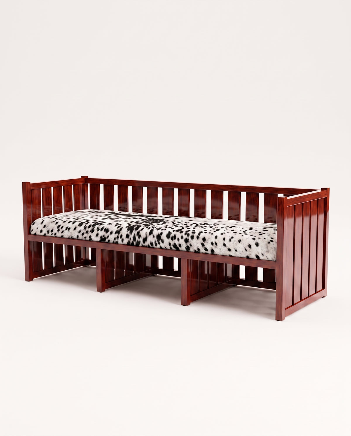 Cardinal three-seat sofa in mahogany lacquered wood with slatted frame and black and white hair-on-hide cushion, Monde Singulier Editions, three-quarter view