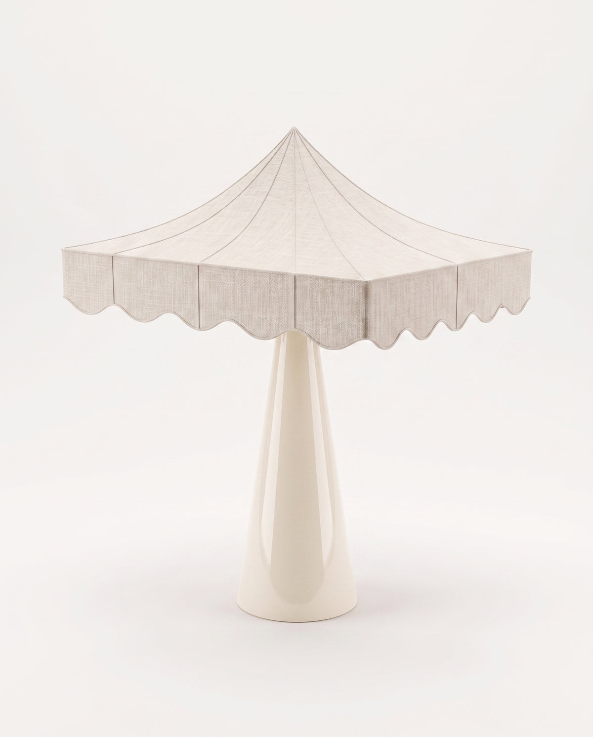 Romance table lamp with scalloped tent shade in paper on a conical off-white lacquer base, Monde Singulier Editions, front view